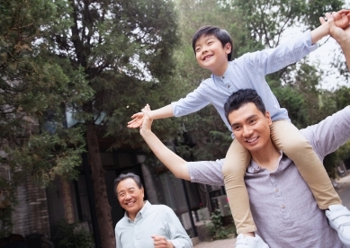 Little Boy on Dad's Shoulders